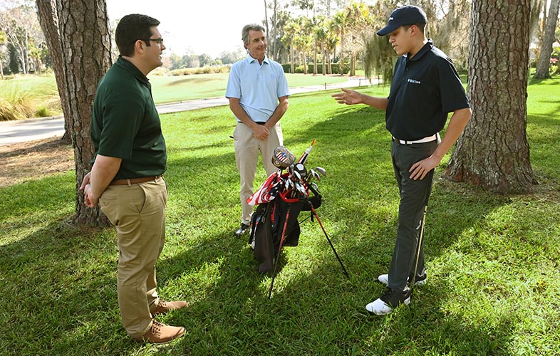 First Tee student with PGA TOUR agronomist and TruGreen agronomist