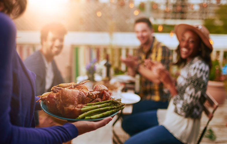 friends enjoying dinner outside